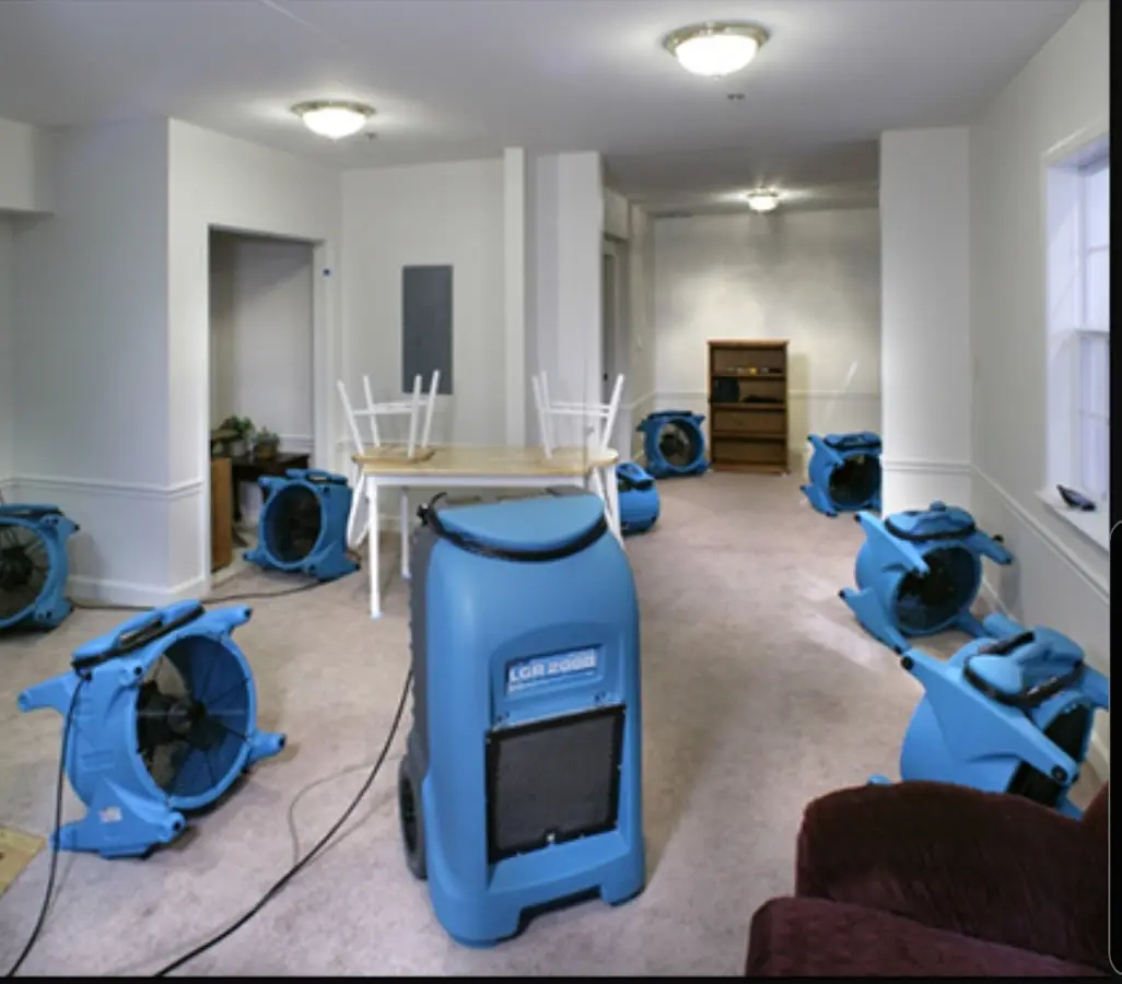 Air movers and dehumidifier setup for Water Extraction & Removal in Acushnet